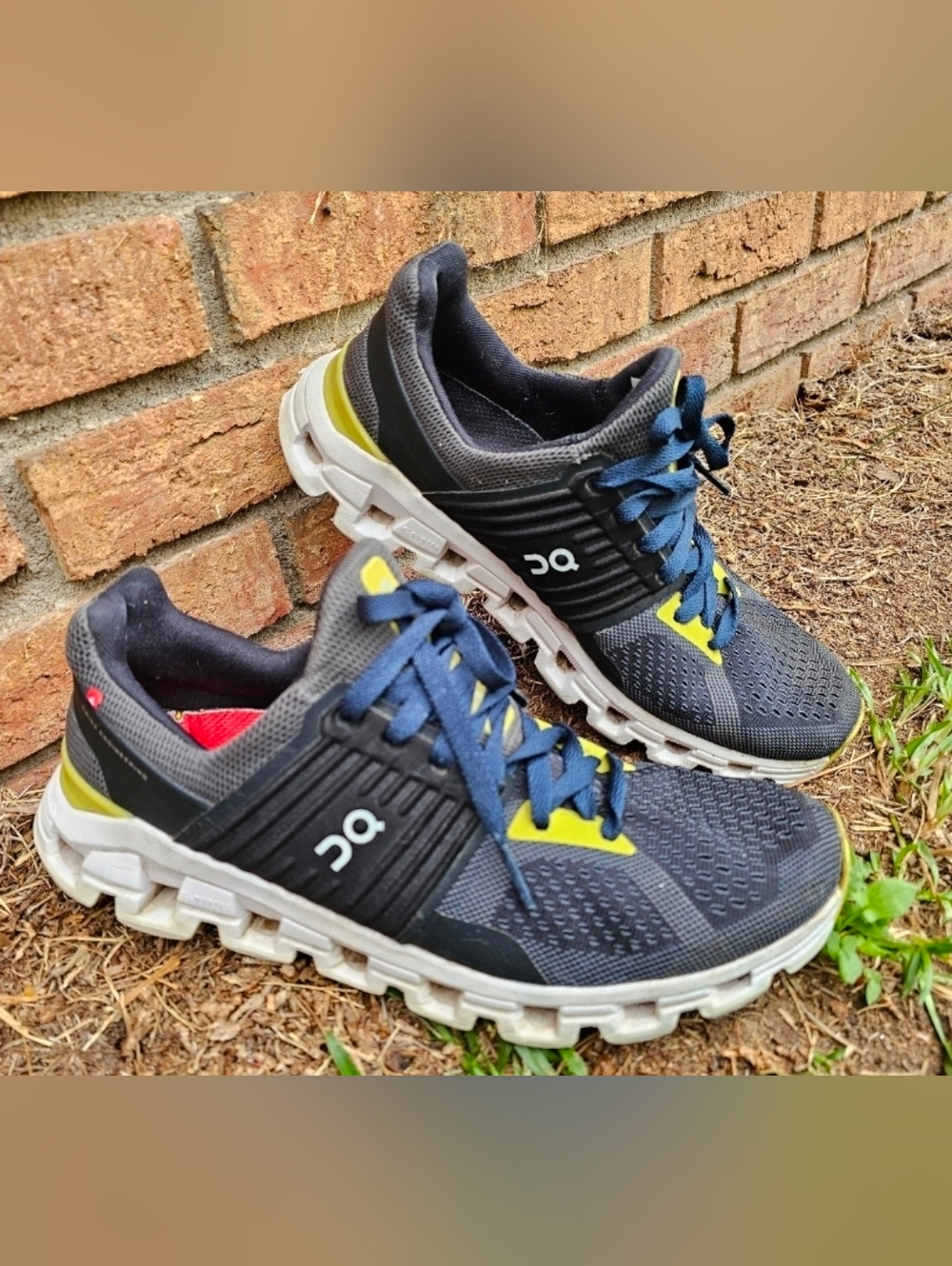 On Running Black and Yellow Sneakers